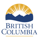 Logo: Half a sun behind the shapes of mountain